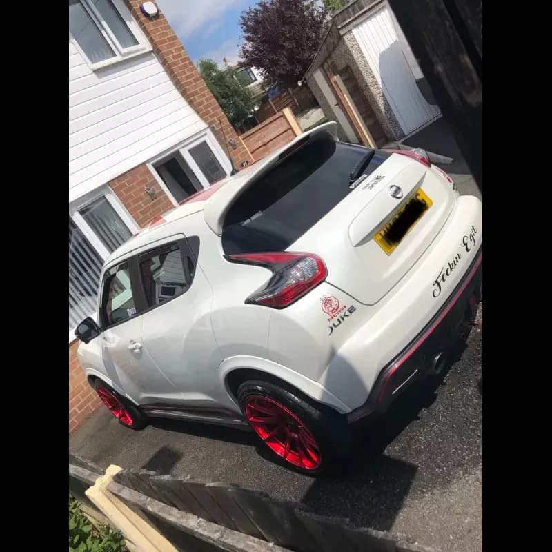 White Nissan Juke Nismo with custom red wheels — detailed by Dr. Autocare, Stockport