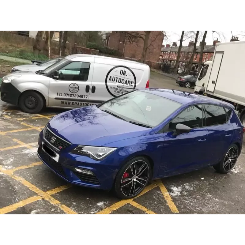 Dr. Autocare branded mobile valeting van alongside a freshly detailed blue SEAT Leon in Stockport